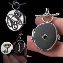 Load image into Gallery viewer, Crow Magic Stash Locket, with River Rock and Garnet - Rumination Jewelry