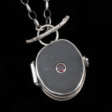 Load image into Gallery viewer, Crow Magic Stash Locket, with River Rock and Garnet - Rumination Jewelry